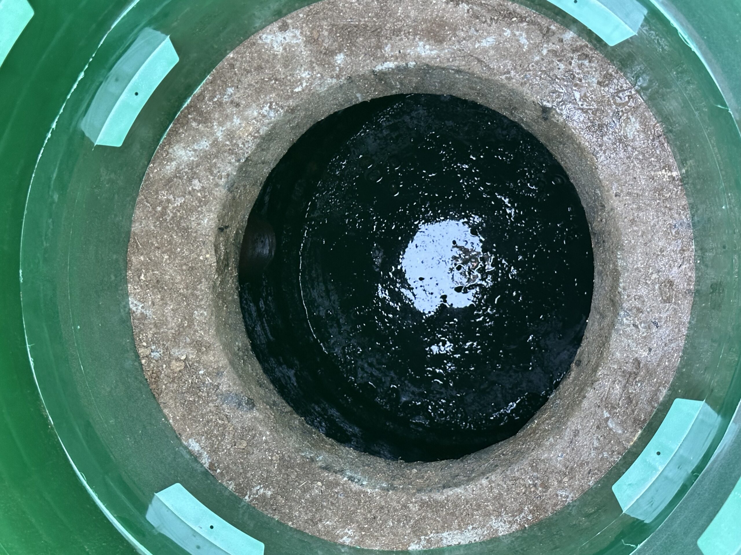 Septic-Tank-Pumping Cleaned septic tank after removing root intrusion, showing a clear and restored tank interior